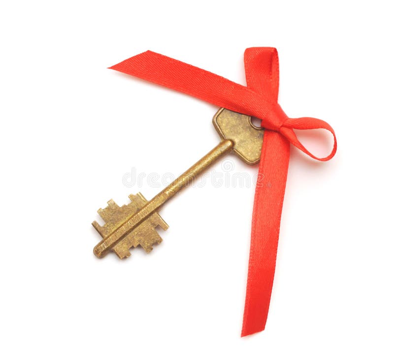 Old key with red ribbon