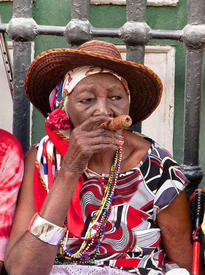 Old lady with a cigar stock photography Old lady with a cigar stock photography