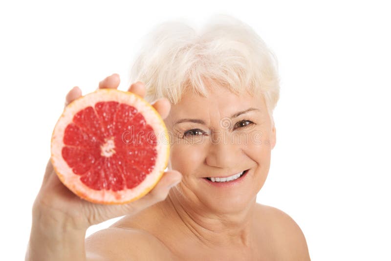 An Old Lady is Holding a Grapefruit. Spa Concept Stock Photo Image of
