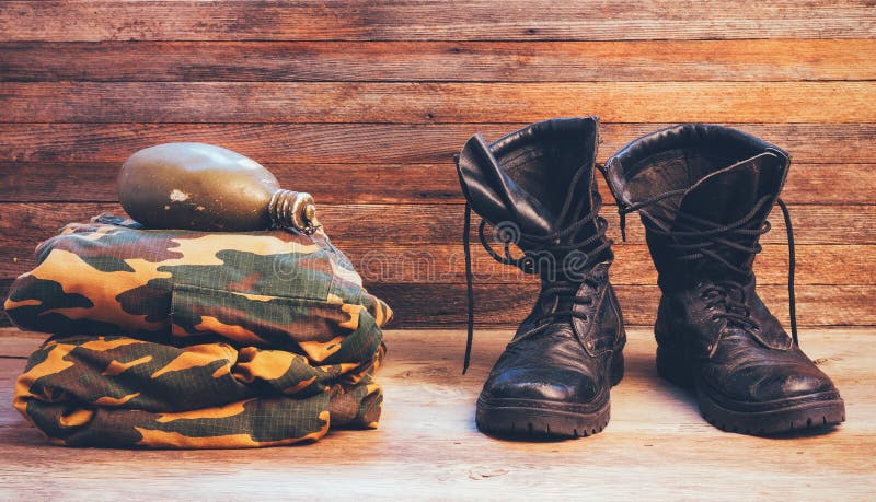 Field Camouflage Clothing on the Shelf of a Specialized Warehouse-store ...