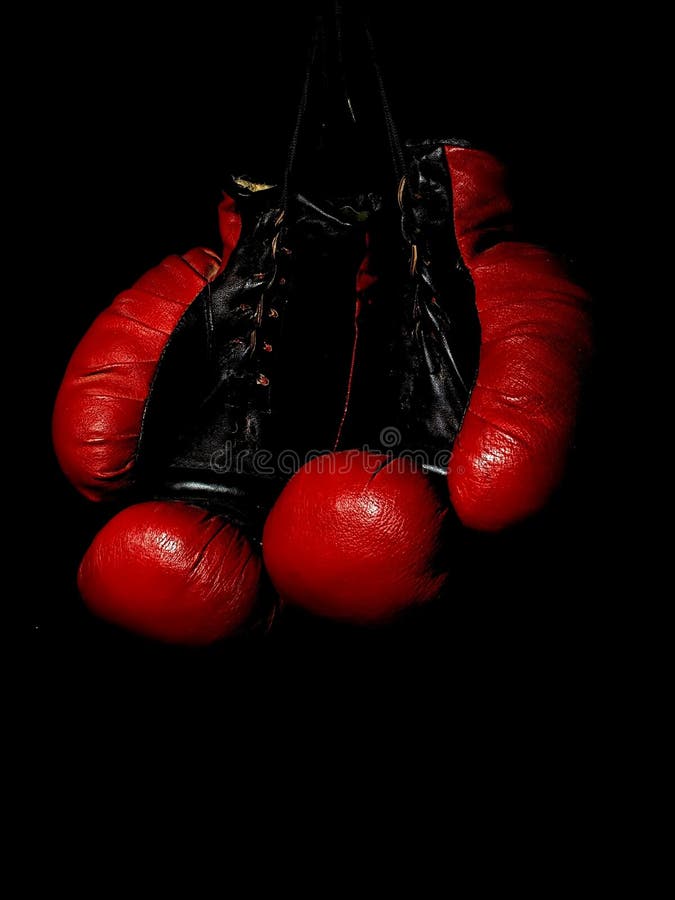 Old Leather Red Boxing Gloves Hanging in the Dark Stock Image Image