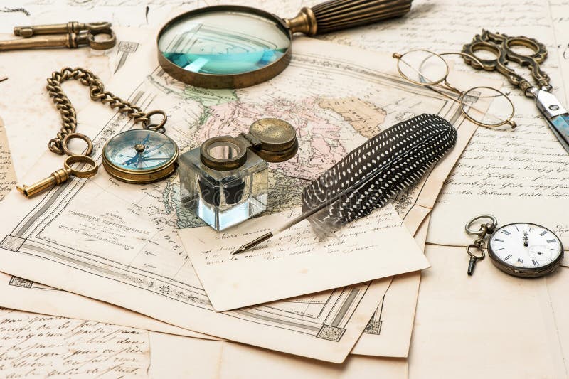 Old letters and maps, vintage ink pen, antique accessories