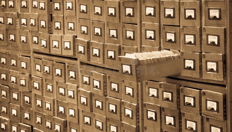 Old library or archive reference catalog with one opened card drawer. Database and knowledge catalogue concept. stock photos Old library or archive reference catalog with one opened card drawer. Database and knowledge catalogue concept. stock photos