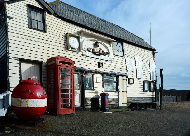 Old Lifeboat Station, red telephone box and WWII mine stock photos Old Lifeboat Station, red telephone box and WWII mine stock photos