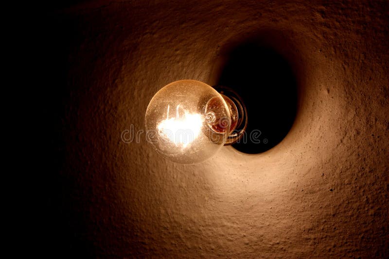 Old light bulb on the wall