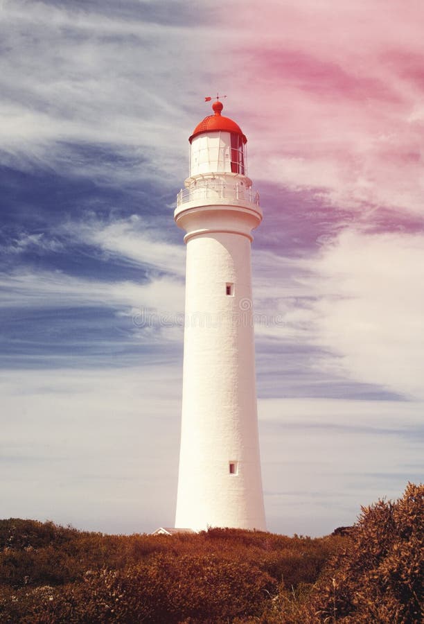 Old lighthouse closeup in sunset