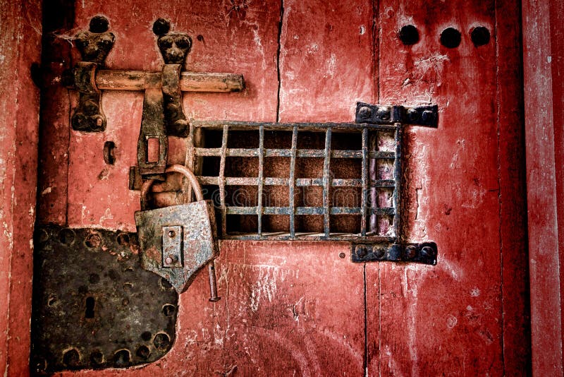 Old Lock and Locking Hardware on Antique Jail Door