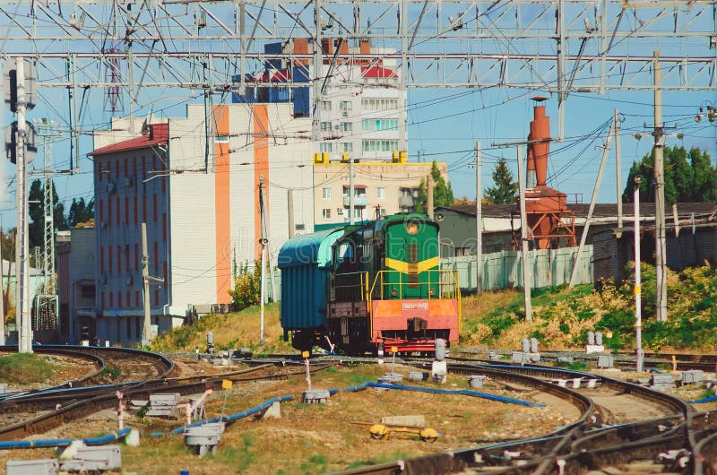 Old locomotive, rzd train rides on rails.Transport infrastructure of Russian. stock photos Old locomotive, rzd train rides on rails.Transport infrastructure of Russian. stock photos
