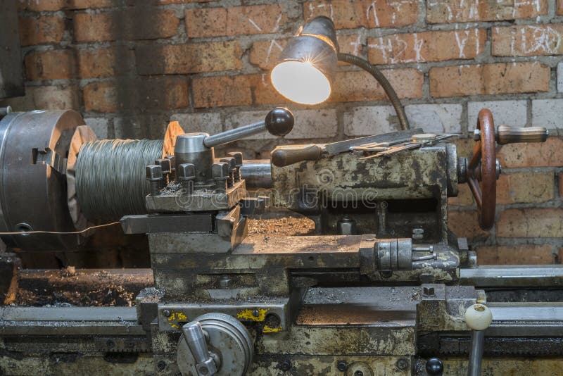 Old machinery in a factory from the mid-20th c. working machine-tool. old lathe. stock photo