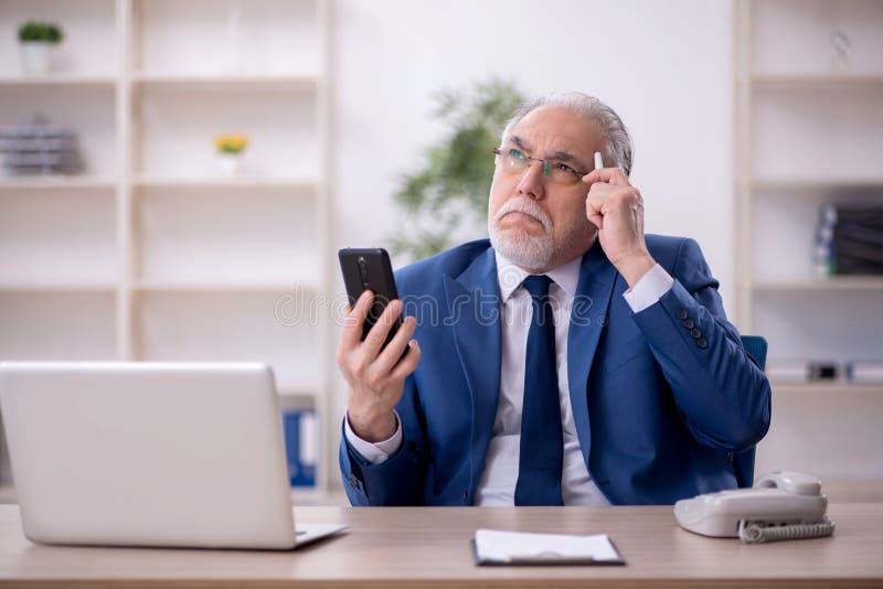 Old Male Boss Working at Workplace Stock Photo Image of concentrated