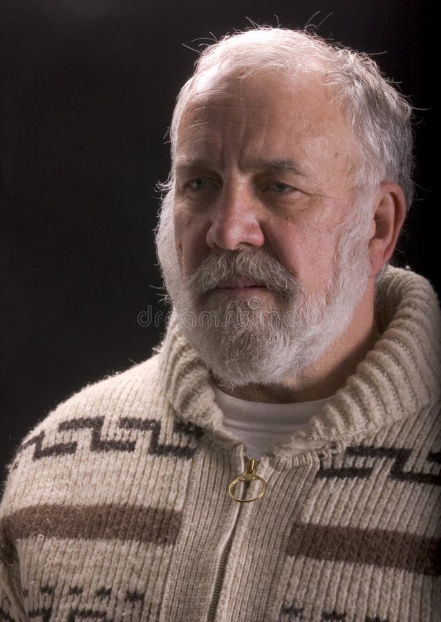 Old man with beard in sweater