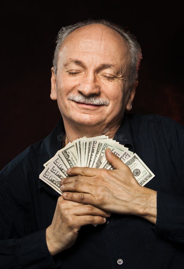 Old man with dollar bills stock photo. Image of caucasian 175836562
