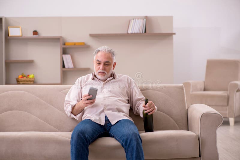 Old Man Drinking Alcohol at Home Stock Image Image of changing