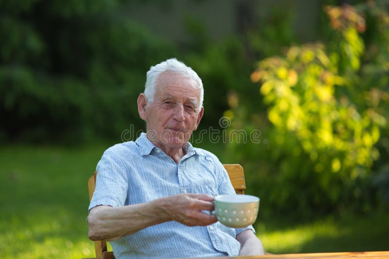 Old Man Drinking Tea in Garden Stock Image Image of male, enjoying