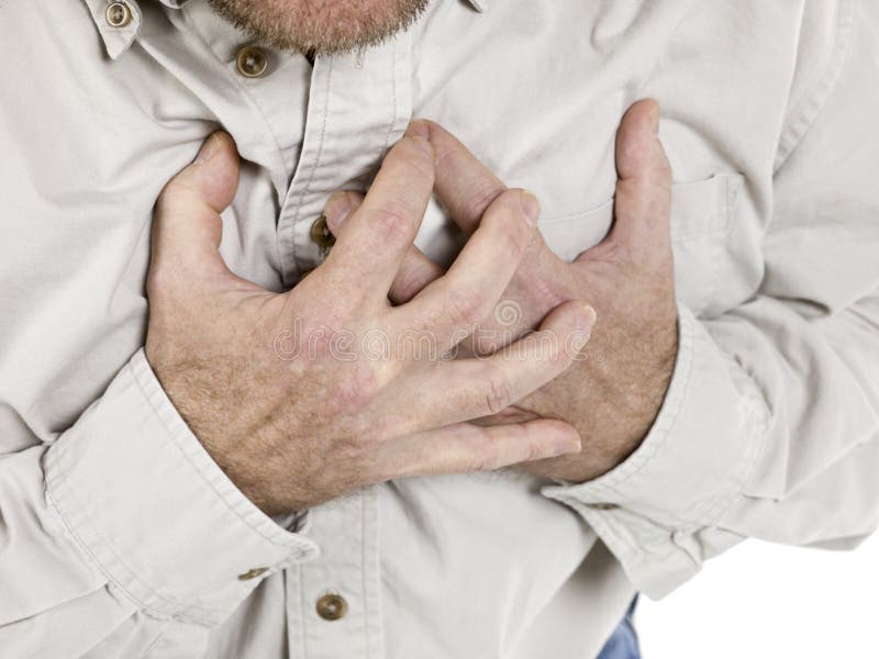 Old man holding his chest. Image of an old man holding his chest suffering from the heart attack royalty free stock photography