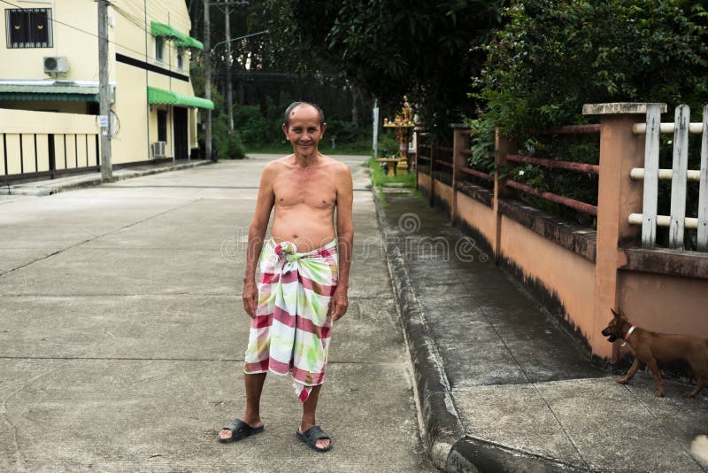 Old man with loincloth standing on public street. royalty free stock photo Old man with loincloth standing on public street. royalty free stock photo