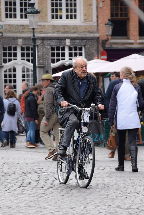 Download Old man riding editorial photo. Image of candid, europe ...