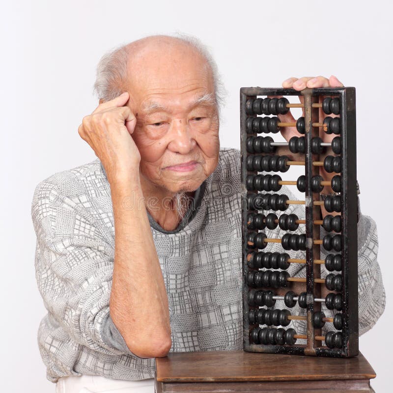 Old man use chinese abacus