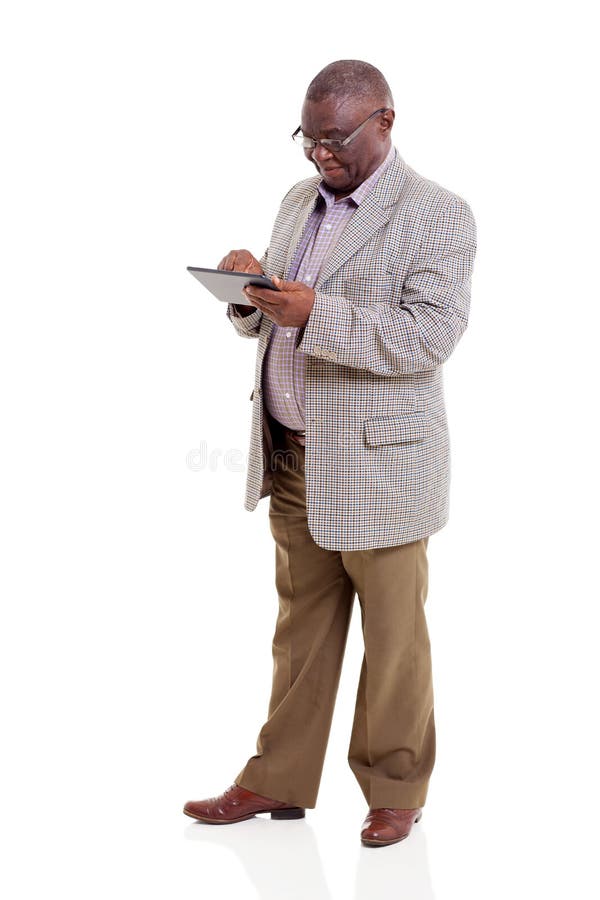 Old man using tablet stock photo Old man using tablet stock photo