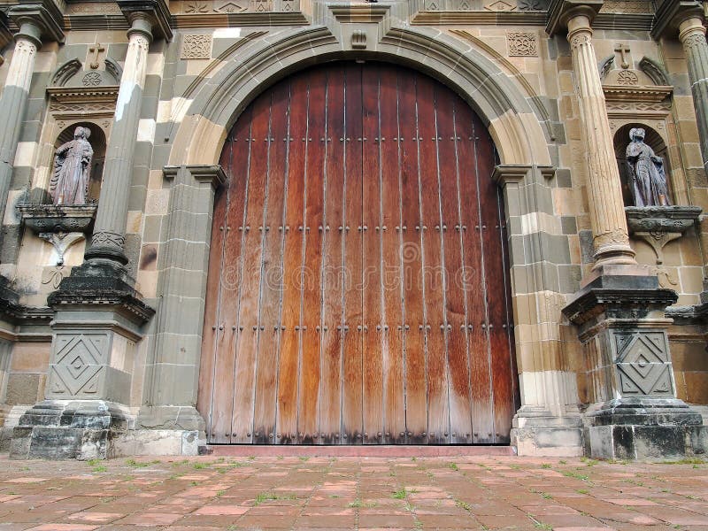 Old massive door of the Metropolitan Cathedral in Casco Viejo, Panama City, Panama. Old massive door of the Metropolitan Cathedral in Casco Viejo, Panama City, Panama