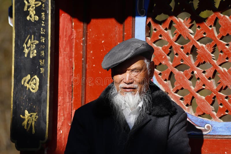 An old men in a village in Yunnan, China stock photo An old men in a village in Yunnan, China stock photo