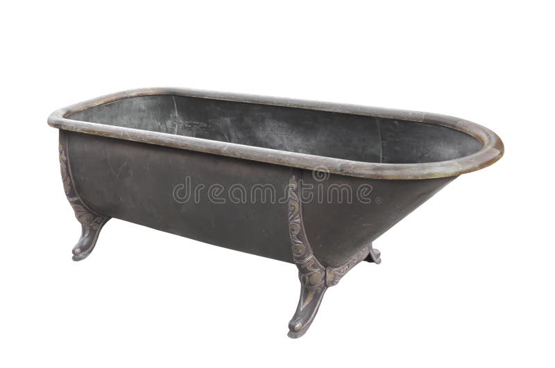 Old and worn large free-standing metal bathtub with feet. 