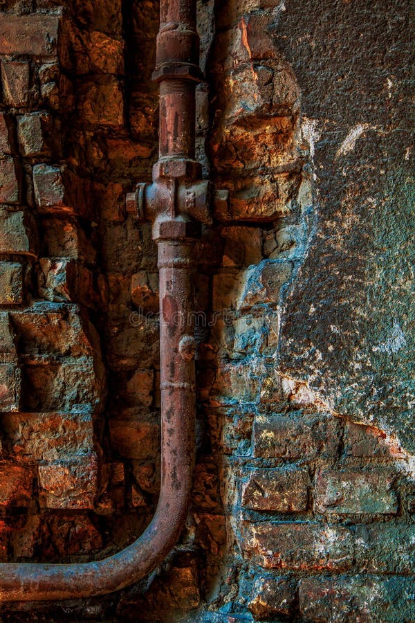 Pipe on brick wall stock photo. Image of wall, angle 36331894