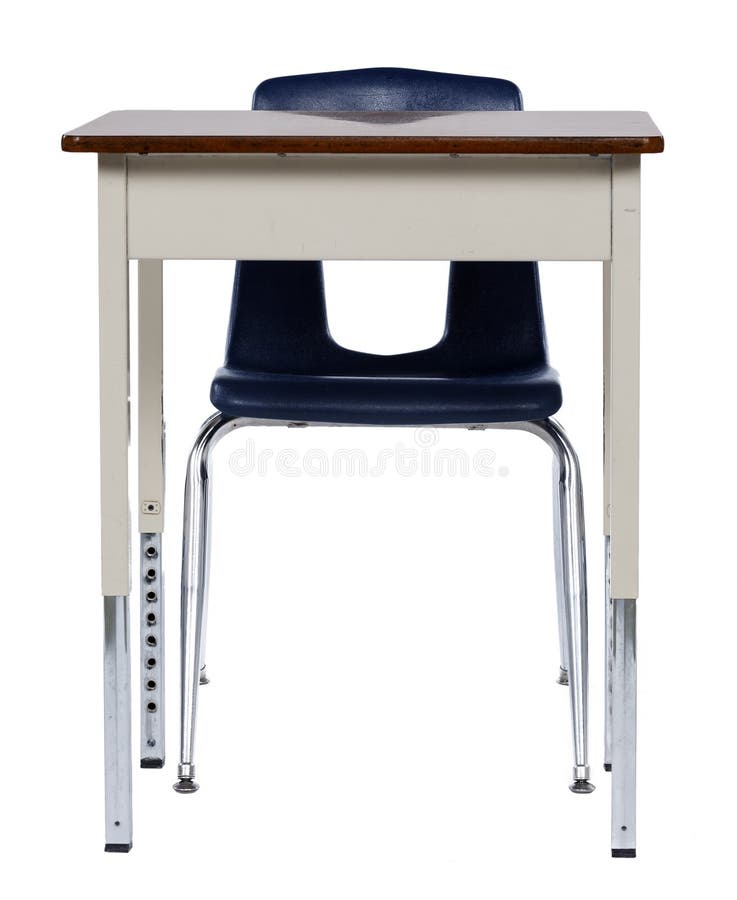 Old metal school desk and chair isolated on white.