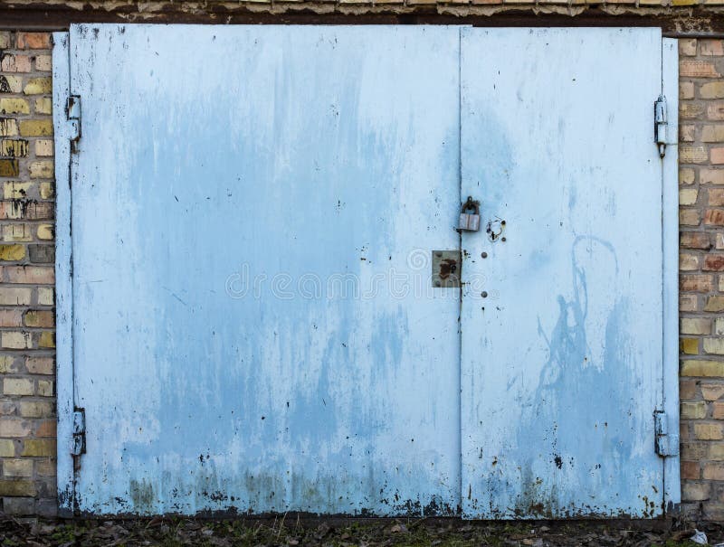 Old metal warehouse door stock photo. Image of industrial - 70352402