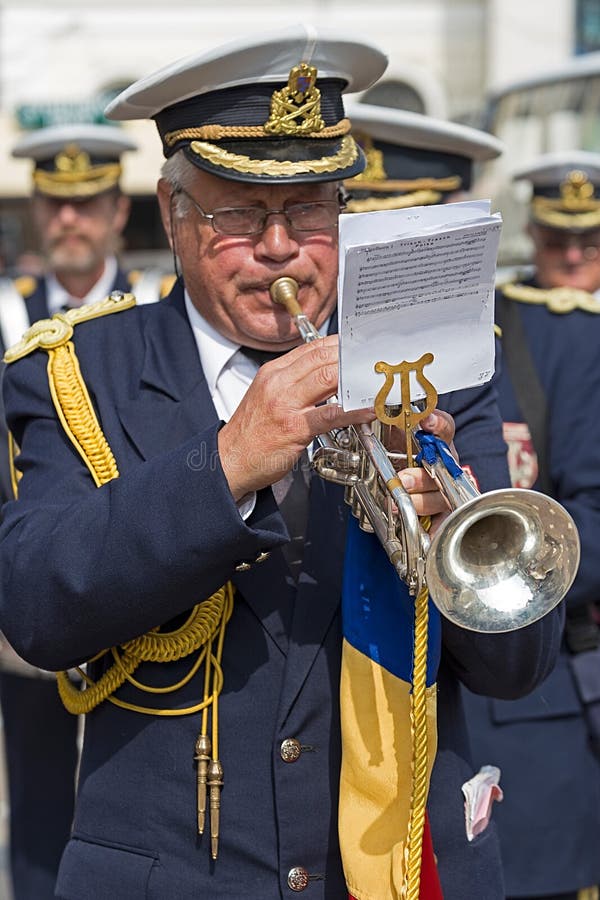 TIMISOARA, ROMANIA - SEPTEMBER 25, 2016: Old military singer from Banat, Romania, playing at trumpet with occasion of ,,Festival of fanfares organized by the Timisoara City Hall.