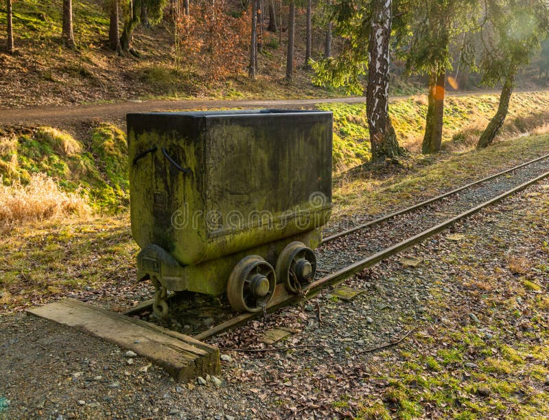 Old mining cart on tracks in open air museum by Stribro stock photography Old mining cart on tracks in open air museum by Stribro stock photography