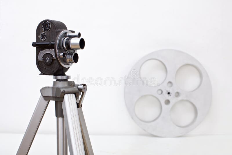 Old 8 Mm Camera and Film Reel on White Stock Image - Image of celluloid,  motion: 112420357