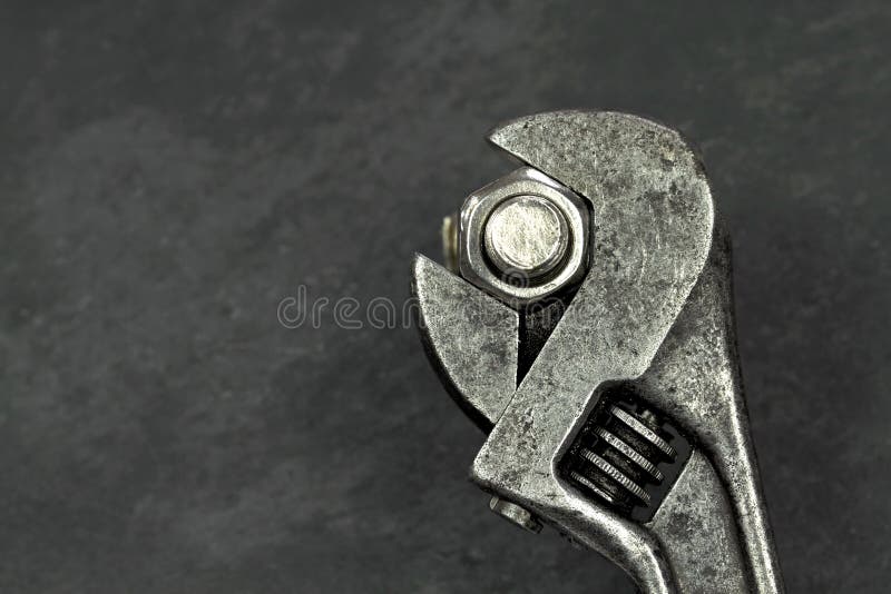 Old monkey wrench and bolt nut royalty free stock photos