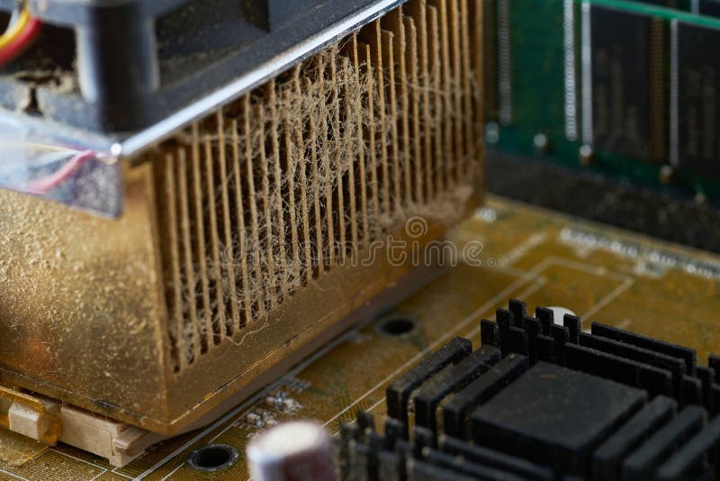 Old Motherboard Covered in Dust and Dirt. Closeup Stock Photo Image