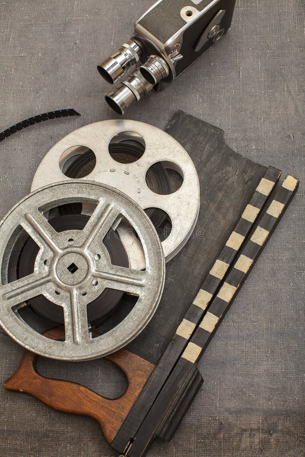 Old Movie Camera, Film Reels and Clapperboards Stock Image - Image