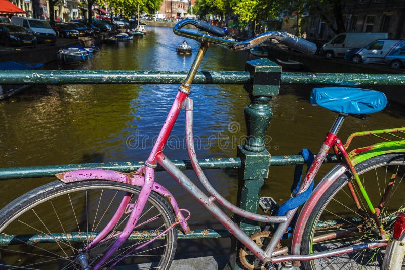 Old Multicolor Vintage Bicycle in Amsterdam, Netherlands Stock Image ...