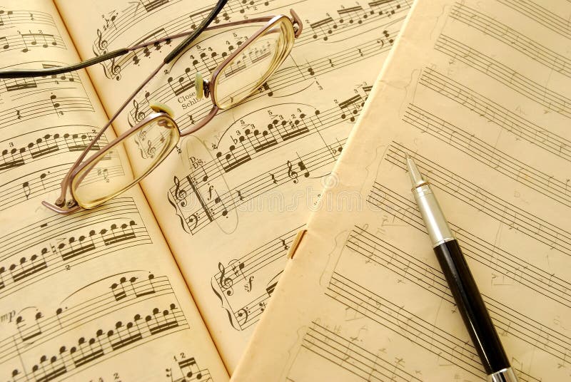 Old music score, manuscript and pen