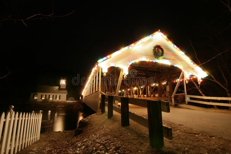 Old new england covered bridge with church at night #2
