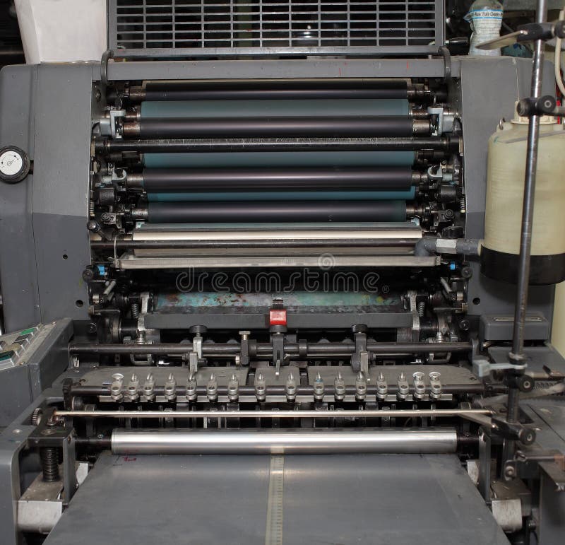 Old offset machine in printing workshop stock images