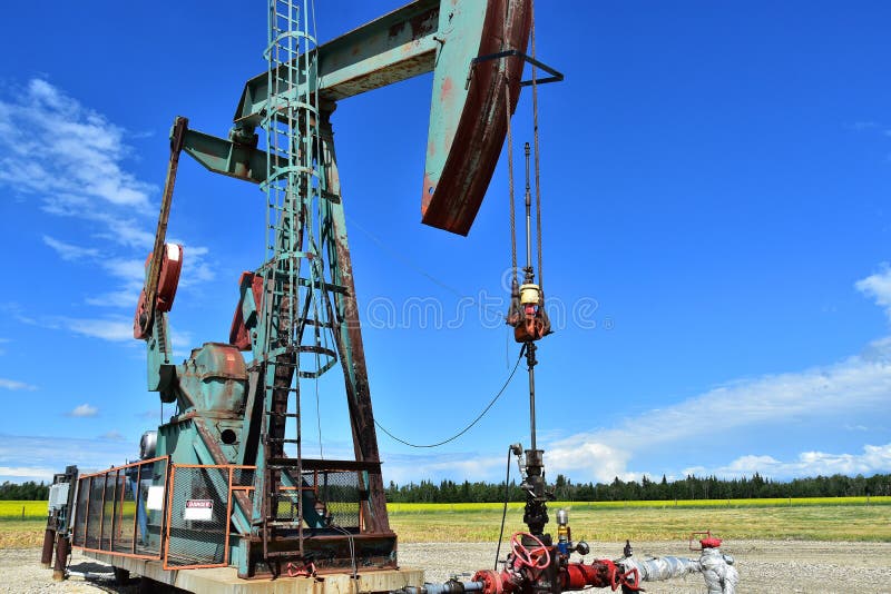 Old Oil and Gas Pump Jack stock photo. Image of technology 123258192