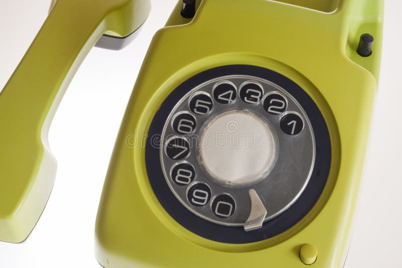 Old olive-green telephone stock image