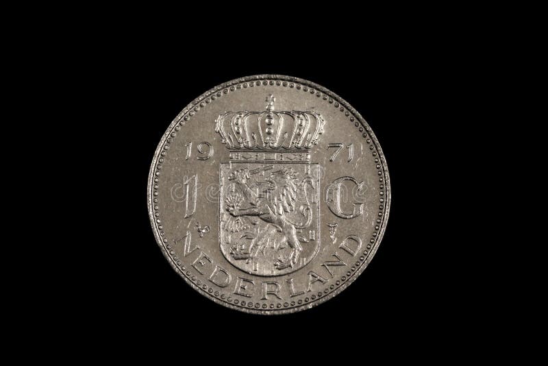 An old one Dutch guilder coin on black