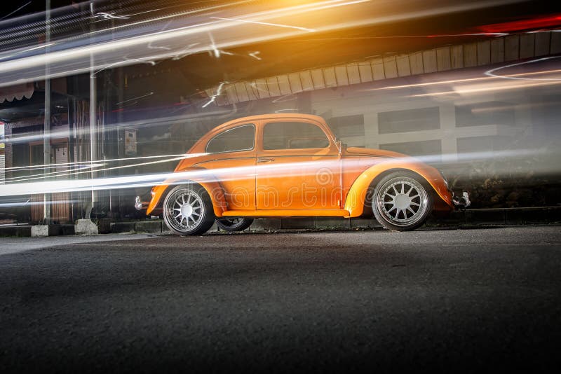 Old Orange Car Parked in the City Along the Road Stock Photo Image of american, beetle 163682104