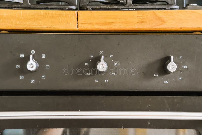 A Close Up of a Stove with Two Dials Stock Image Image of stove