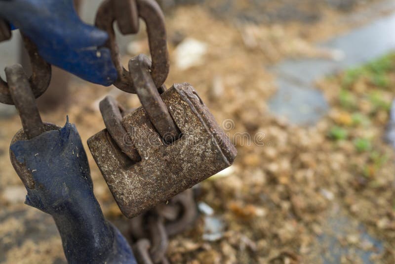 Old padlock chain lock as safety and security or eternity concept royalty free stock photos