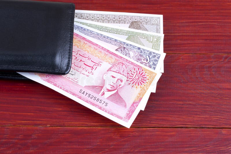 Old Pakistani money in the black wallet royalty free stock images Old Pakistani money in the black wallet royalty free stock images