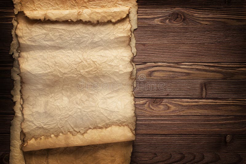 Rolled Out Wax Paper On Wooden Table Stock Photo - Download Image