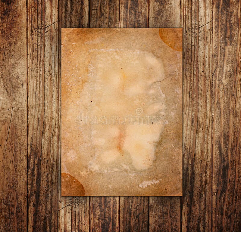 Old paper on the wood stock photo