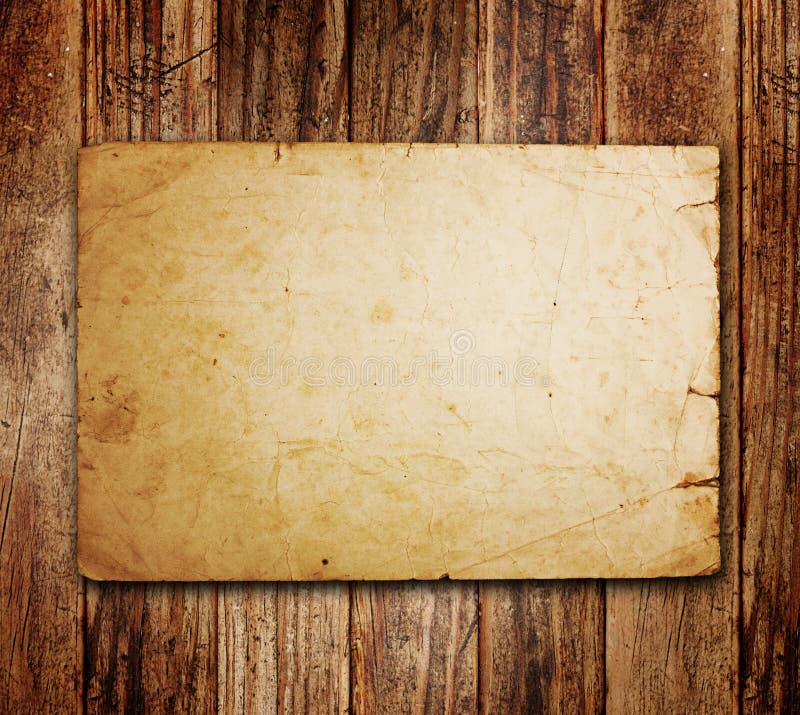 Old paper on the wood royalty free stock photography