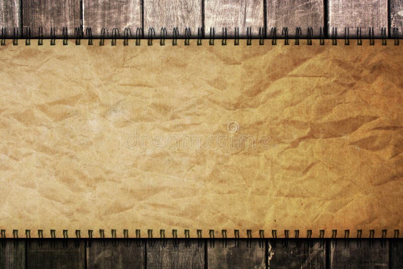 Old paper on wooden background